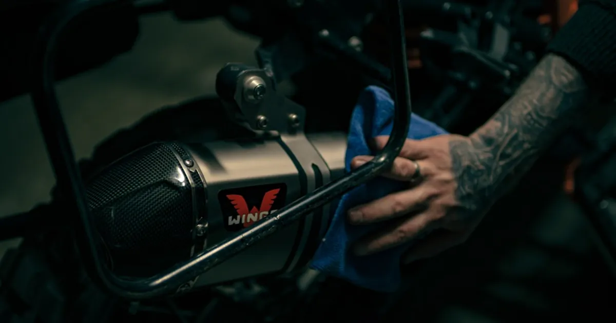 a close up of a person's hand on a motorcycle