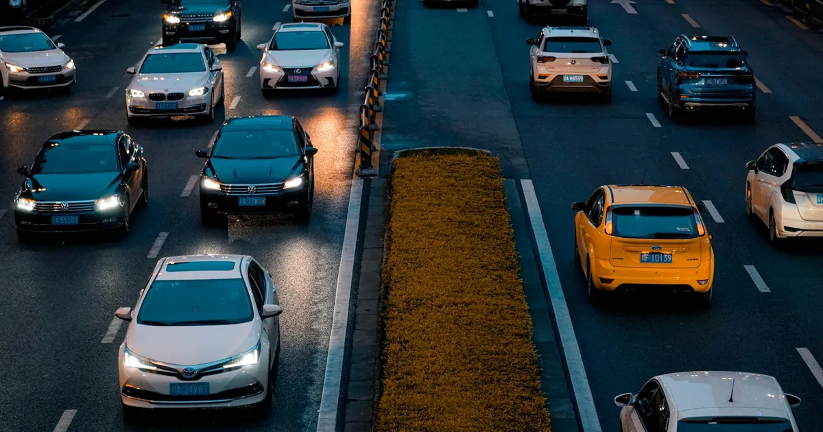 Traffic flows steadily on a bustling highway in Chengdu, China, capturing the city's evening commute.